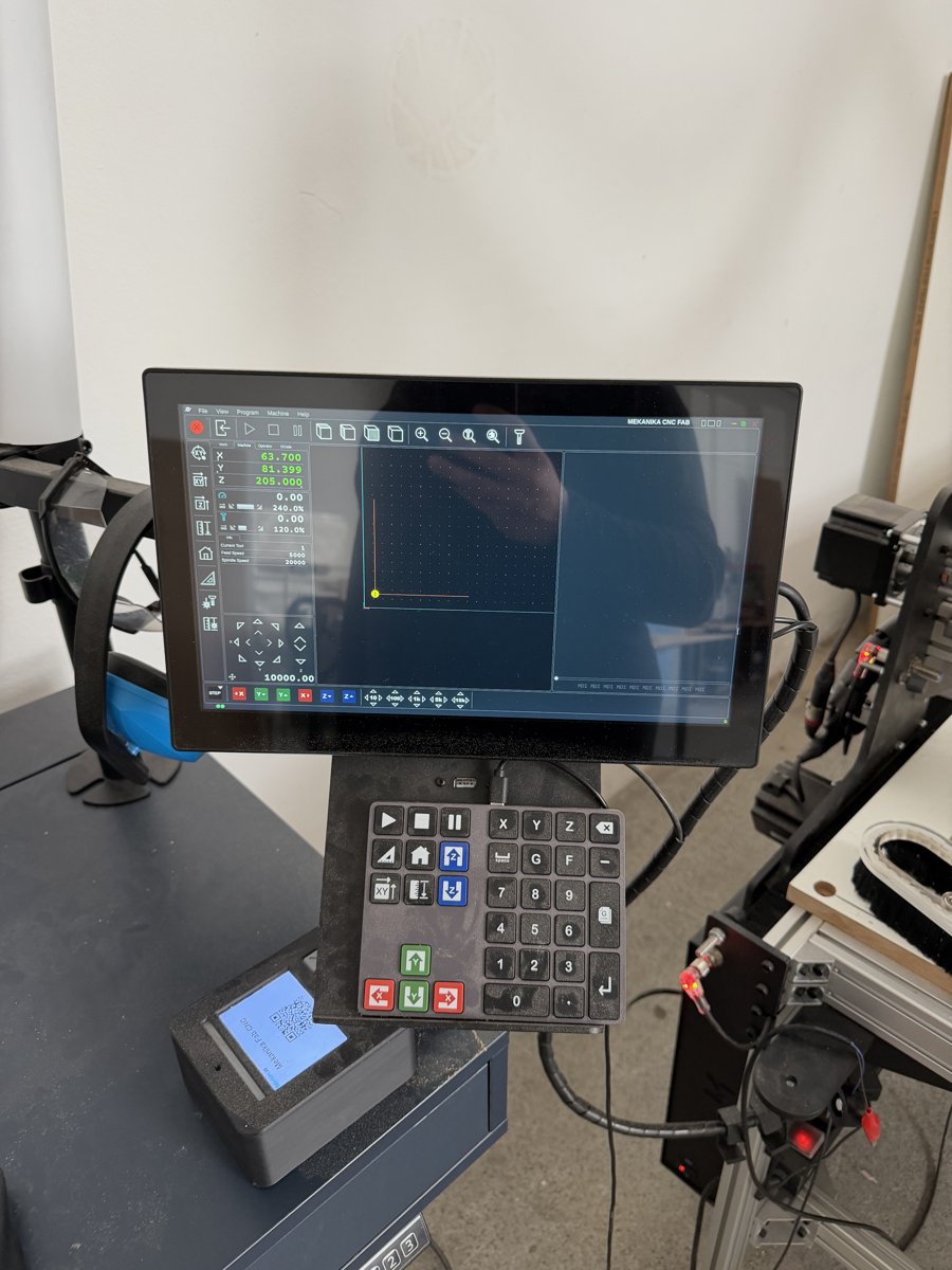 Control display and jog pendant running Planet CNC